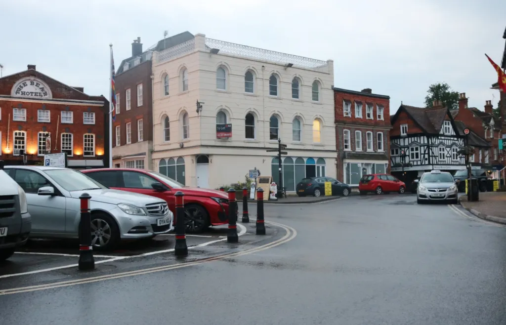 The Bear Hotel and the pale stuccoed old town hall on the south side of Wantage Market Place